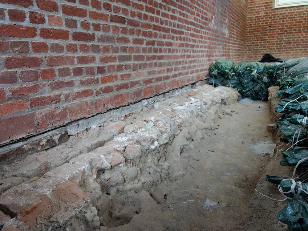 A cutout along the south wall of the Jamestown Memorial Church will be enclosed in glass, allowing visitors to see the foundation of the 1640s church. (WYDaily/ Andrew Harris)