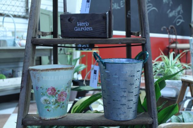 Jan Wiener said she loves to take old wooden ladders and repurpose them. Several in her shops serve as displays tables. She said they are popular wedding decorations. (WYDaily/ Andrew Harris)