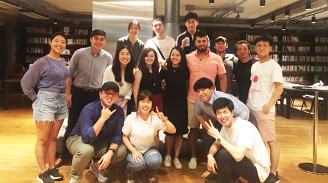 Troy Wiipongwii MPP ’18 (center row, pink shirt) poses with some of the people involved with the Blockchain project he instituted in collaboration with Professor Mike Tierney. (WYDaily/Courtesy Global Research Institute)