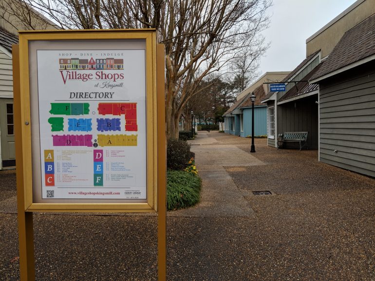 The Village Shops at Kingsmill have been approved for redevelopment. Most of the shopping center is vacant, and an outdated directory shows several businesses that have closed in recent years. (WYDaily/Sarah Fearing)