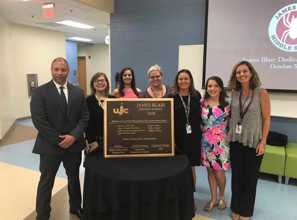 Ty Harris (left) at the dedication of James Blair Middle School at the start of the 2018-2019 school year. Harris was principal of the school but reassigned to the associate principal position on Feb. 6. (WYDaily/Courtesy Eileen Cox)