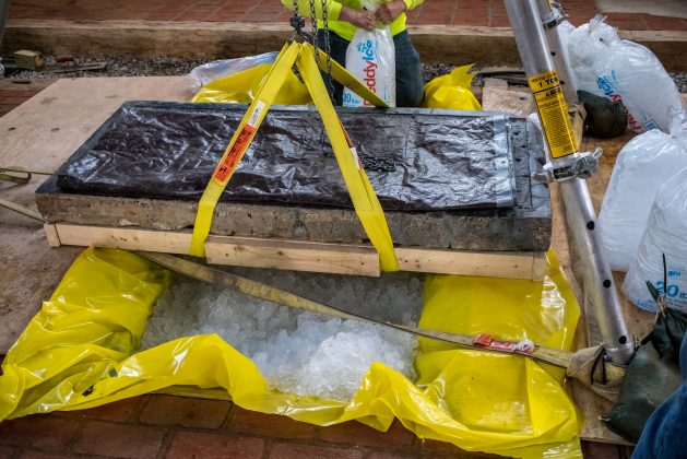The Knight's Tombstone sits above its permanent resting place in the Memorial Church. (WYDaily/Courtesy of Jamestown Rediscovery (Preservation Virginia))