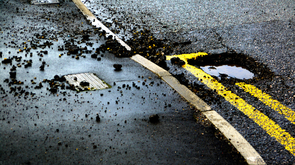 Potholes are more frequent in the spring, but some of the holes might stay on the road longer than others. (WYDaily/Courtesy Flickr)