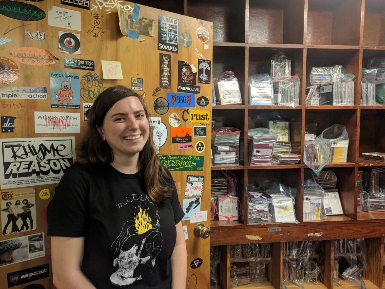 Troitski in front of a small sample of the station's music. WCWM is home to thousands of Vinyl and CDs, one of the largest collections on the East Coast, she said (WYDaily Photo/Benjamin West)