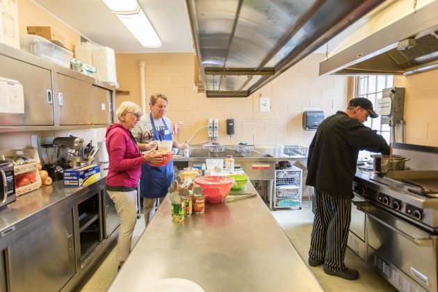 The Williamsburg House of Mercy's kitchen and full time chef, Jovan Kerns hard at work. (WYDaily photo/Francesca Eller)