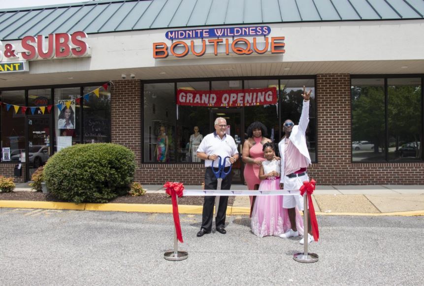 Omar Mallett (right) and his wife Yoland Mallett (middle) have opened a new boutique in York County. (WYDaily/Courtesy York County)