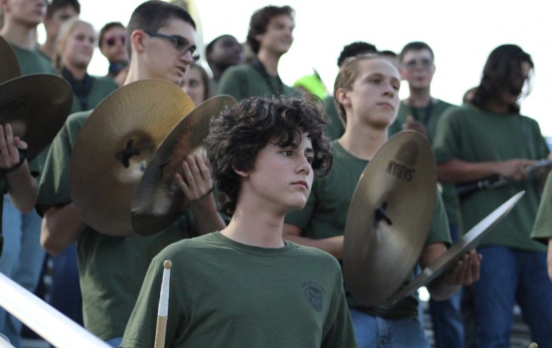 Two students will be representing Williamsburg-James City County in front of an audience of millions at the Macy’s Thankgiving Day Parade in November. Thomas Goldstein, a senior at Lafayette High School, and Charlie Wood, a senior at Warhill High School, have been selected as one of 100 drummers from across the country to participate in the parade in New York City on Nov. 28. “Hopefully this will give me the expeirnce to know what I want to do,” Wood said. “Going up to the city, I want to see if the music is a different style because I might consider going there for school.” Both Wood and Thomas Goldstein started band when they were in the fifth grade and have become the Drum Captains of their school’s band. Thomas Goldstein has been a member of the Colonial Williamsburg Fife and Drum Corps, his mother Chelsea Goldstein said, and that has helped him to put in nearly 40 hours a week of practice. It’s a passion of his, Chelsea Goldstein said, so much to the point that he even makes his own drum sticks and pads. Wood’s experience has been a bit different, he said, because he is a hard-of-hearing student and has to wear a hearing aid in each ear. “Drums have been the one thing I can notice when I hear music,” he said. “When I’m playing, I’m focused and prepared. I can hear it.” Wood and Thomas Goldstein are friends who regularly practice together, Wood said. The idea for auditioning was originally Thomas Goldstein’s after he saw a fellow student take part in the parade last year. One day last spring, the pair were practicing together and Wood thought the opportunity sounded like a good idea. To audition for the parade, the student needs to send in a video of them performing a few pieces. But the competition is stiff, Wood said, as only a hundred out of thousands of applicants across the country are accepted. Wood and Thomas Goldstein sent in their audition videos in February and heard back in March that they had been accepted. Wood said that part of their success is being taught in a district with decent music programs. Over the past seven years, he said he has seen how the schools in the community work together to teach and learn from each other and that’s what makes the music program stand out. “I guess when you start out, you’re just learning basic stuff but then you look up to the high school band and see what they’re doing and say ‘wow I want to do that,’” Wood said. A week before the performance, the drummers will head up to the city where they will practice with the other chosen students, get fitted for the uniforms and spend a bit of time sight-seeing, Chelsea Goldstein said. According the the Music Festivals and Tours website, which organizes the parade, students have to pay $1,689 to participate, which does not include travel expenses. Chelsea Goldstein said the cost is worth it to her family because of the experience her son will remember for the rest of his life. “What a great thing to be able to say you’ve done something like this,” Chelsea Goldstein said. “I think it is a great thing to be able to perform in as many places and venues as possible and this is just an iconic event.”