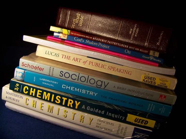Nationally, textbooks are estimated to cost about $600 per semester for an individual student, which is in addition to other fees already paid for tuition, room and board. (WYDaily/Courtesy of Flickr)