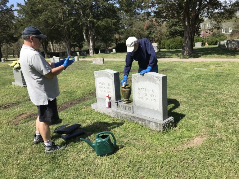 Volunteers help to preserve tombstones at Cedar Grove Cemetery which dates back to 1860. (WYDaily/Courtesy Bill Brown)