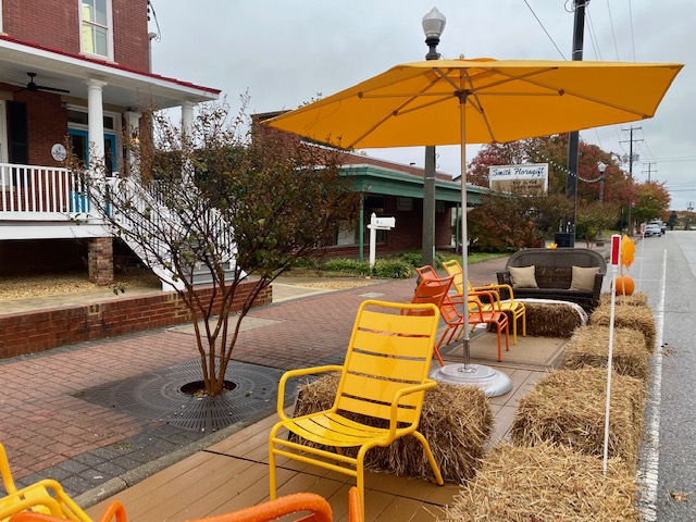 The traveling mini-park, or "parklet," in Hampton is a small casual place for people to socialize. (WY Daily/ Lucretia Cunningham)