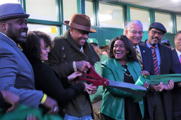 NBA All-Star and Hall of Fame Inductee, Allen Iverson, cuts the ribbon to Bethel High School's now "Allen Iverson Gymnasium." (WYDaily/Lucretia Cunningham)