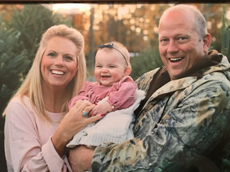Karen and Nathan Wilcox with their granddaughter, Natalee at the Wilcox Virginia Christmas Tree Farm (WYDaily Photo/ Courtesy of Nathan Wilcox)