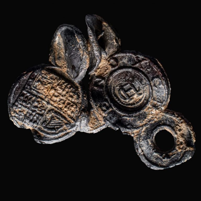 Catherine Davis, a PhD student in anthropology at William & Mary and extern at Historic Jamestown, is working on a project to organize and catalog more than 300 lead cloth seals at Historic Jamestown. (WYDaily/Courtesy Historic Jamestown)