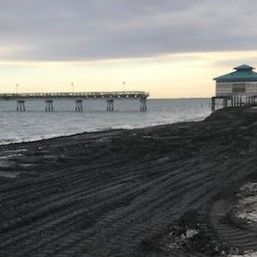 Sand on Buckroe Beach is considerably darker after dredged sand from Indian Creek was used to replenish it. (WYDaily/Courtesy City of Hampton)