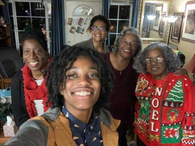 Airman 1st Class Bobbie Briggs, front, takes a selfie with her Adopt-an-Airman family, Dec. 25, 2018 in Fairfield, Ca. The Adopt-an-Airman program is designed to connect Airmen living in the dorms with local families to develop lasting relationships based on shared interests and hobbies. (WYDaily/Courtesy Bobbie Briggs)