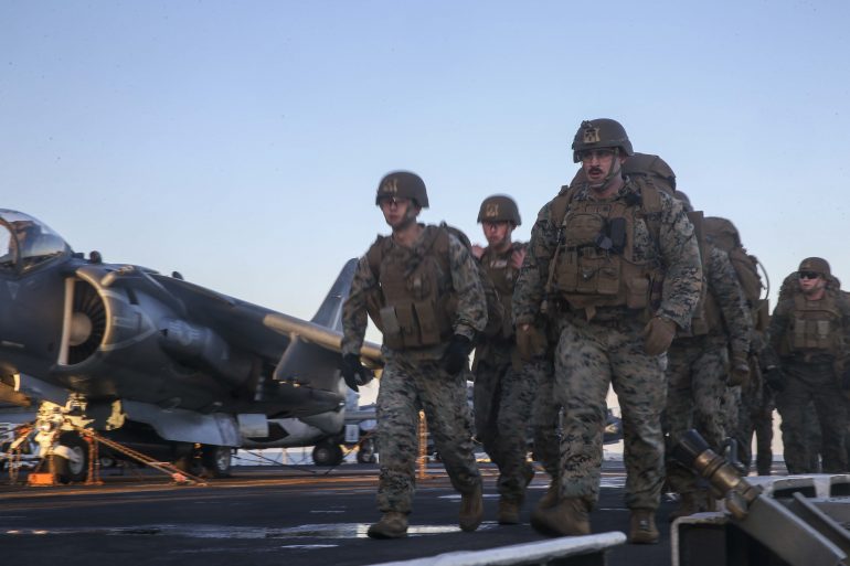 U.S. Marines with the Combined Anti-Armor Team, Weapons Company, Battalion Landing Team, 2nd Battalion, 8th Marine Regiment, 26th Marine Expeditionary Unit, conduct a hike aboard the Wasp-class amphibious assault ship USS Bataan (LHD 5) in the Mediterranean Sea, Jan. 7, 2020. Bataan, homeported in Norfolk, is operating in the U.S. 6th Fleet area of operations in support of U.S. national security interests in Europe and Africa. (U.S. Marine Corps photo by Cpl. Tanner Seims/Released)