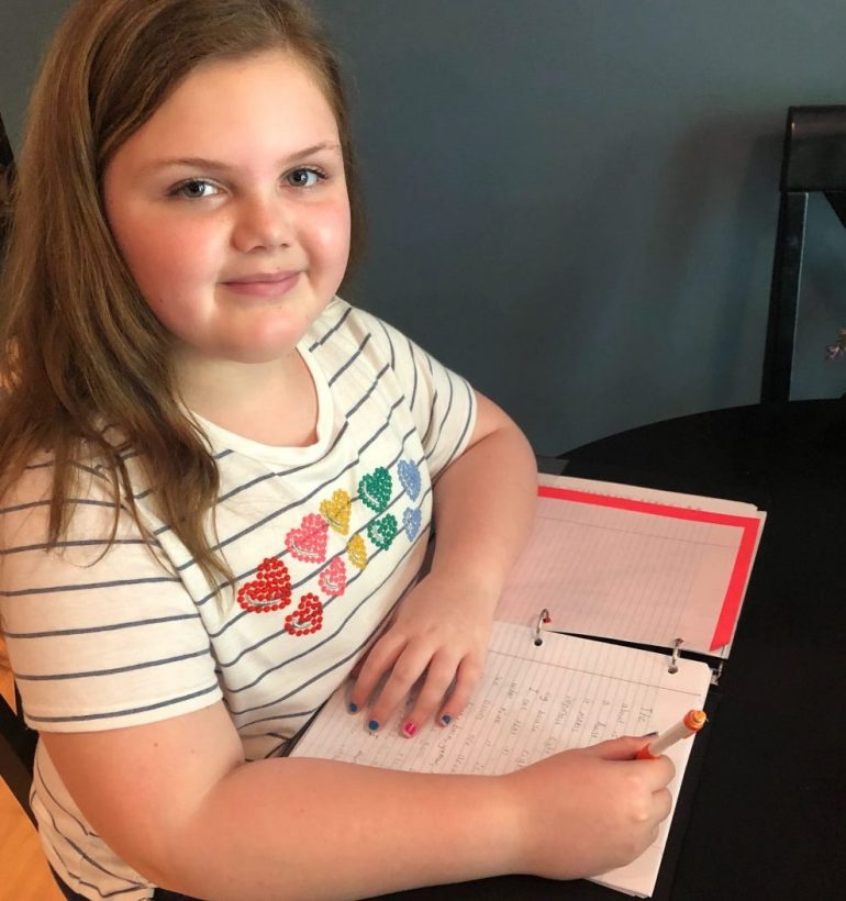 Brynn Larson, 9, had been upset when she wasn't able to write her pen pal after schools closed in response to the coronavirus. But thanks to help from her mother and social media, her letters are being seen. (WYDaily/Courtesy Erin Larson)