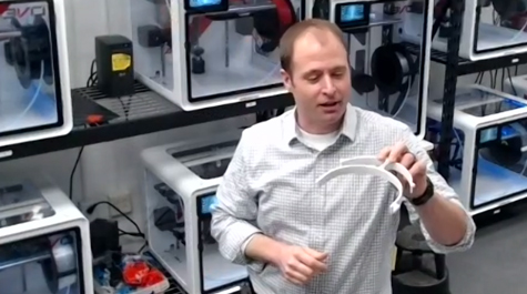 Jonathan Frey looks over a freshly printed visor portion of a face shield during an online class he hosted from the Swem Library makerspace. (WYDaily/Courtesy of W&M)