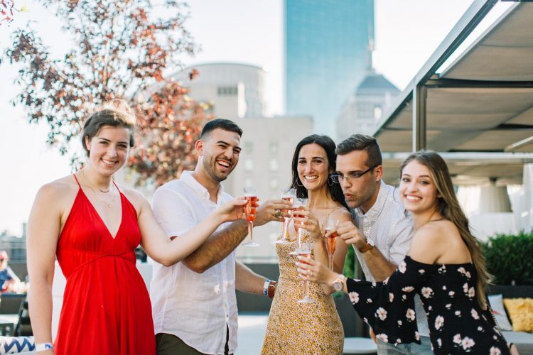 Maxwell Groene proposed to Cara Evans at a rooftop bar in Boston last July. After planning a wedding for nearly a year though, the couple will have a different kind of ceremony with less than 10 loved ones present. (WYDaily/Courtesy Maxwell Groene)