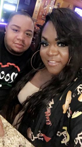 Symon "Mel" Howard and his fiancé, Amore. Howard is a black trans man who is pansexual. (WYDaily/ Courtesy of Symon Howard)