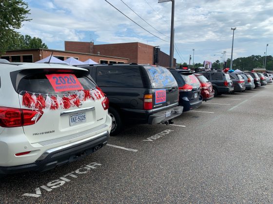Cars filled the parking lot of Bailey Field to honor graduates in a drive-thru ceremony. (Alexa Doiron/WYDaily)