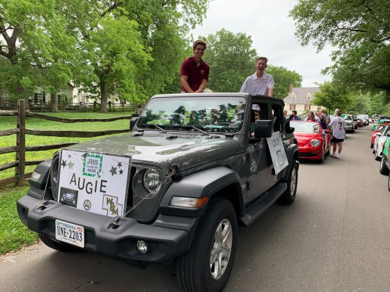 Graduates waited patiently for the procession to start while spending time with friends. (WYDaily/Alexa Doiron)