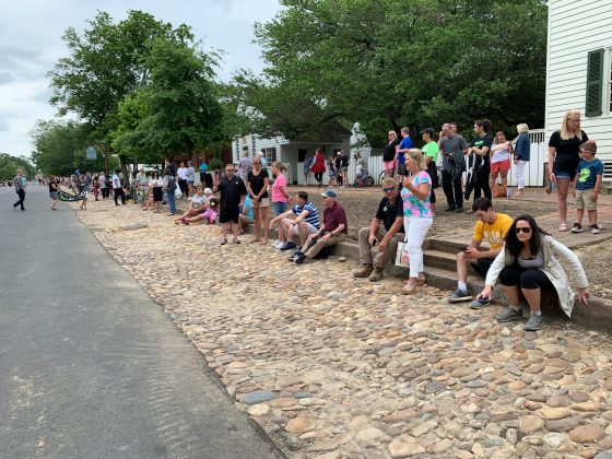 Families and loved ones lined Duke of Gloucester Street as the procession began. (WYDaily/Alexa Doiron)
