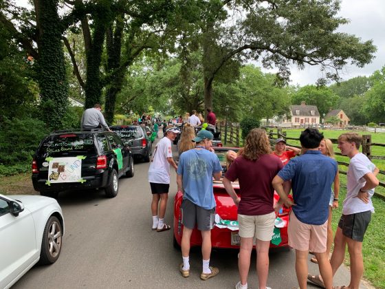Prior to the parade, graduates wove in-between cars to chat with friends. (WYDaily/Alexa Doiron)