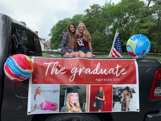 Many cars were decorated with photos of the graduates and where they were attending university in the fall. (WYDaily/Alexa Doiron)