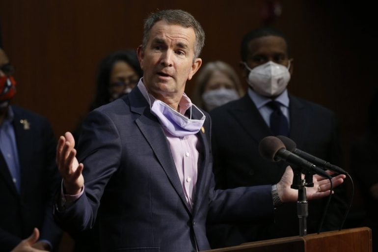 Gov. Ralph Northam speaks during a news conference in Richmond in June. (AP file photo)