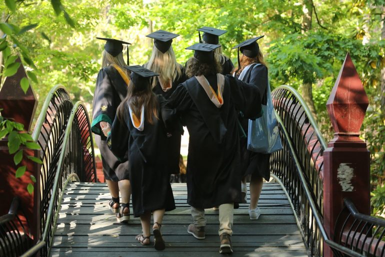 Students taking the traditional walk across campus. (WYDaily file/Courtesy of Stephen Salpukas, W&M News)