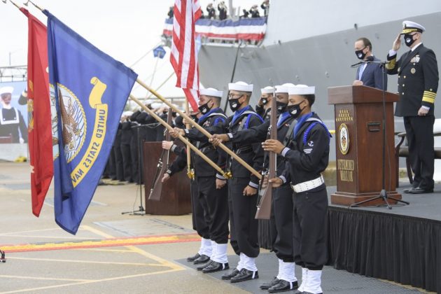 The USS Cole Color Guard parades the colors during the National Anthem at the Arleigh Burke-class guided missile destroyer USS Cole (DDG 67) 20th Anniversary memorial ceremony at Naval Station Norfolk. (U.S. Navy photo by Mass Communication Specialist 2nd Class Darien G. Kenney)