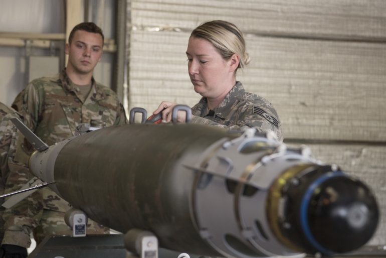 Staff Sgt. Jonquil Willard, 192nd Maintenance Squadron munitions controller, leads bomb build training with Airmen from 1st Fighter Wing and 192nd Wing MXS Ammo Flights on March 11, 2020, at Joint Base Langley-Eustis. ((U.S. Air National Guard photo by Tech. Sgt. Lucretia Cunningham)
