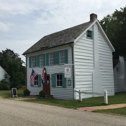 On the Hill Gallery is located at 402 Main Street in Historic Village between Read and Church streets.