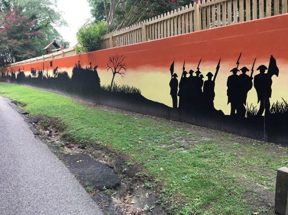 This photo was taken after students from Tabb High School and York Middle School repainted the Revolutionary War mural on Read Street in Historic Yorktown in June 2021. (WYDaily/Jennifer Holden)ly/Jennifer Holden)