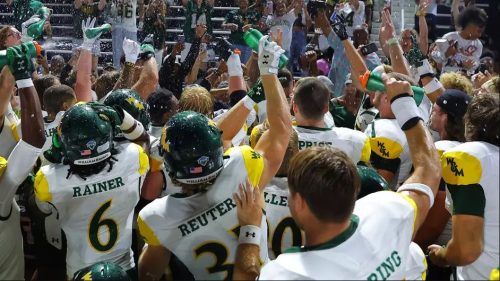 William & Mary Football players celebrate after their victory of Villanova.